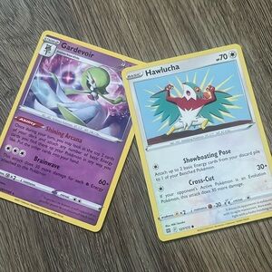 Gardevior and Hawlucha pokemon cards both for 9$